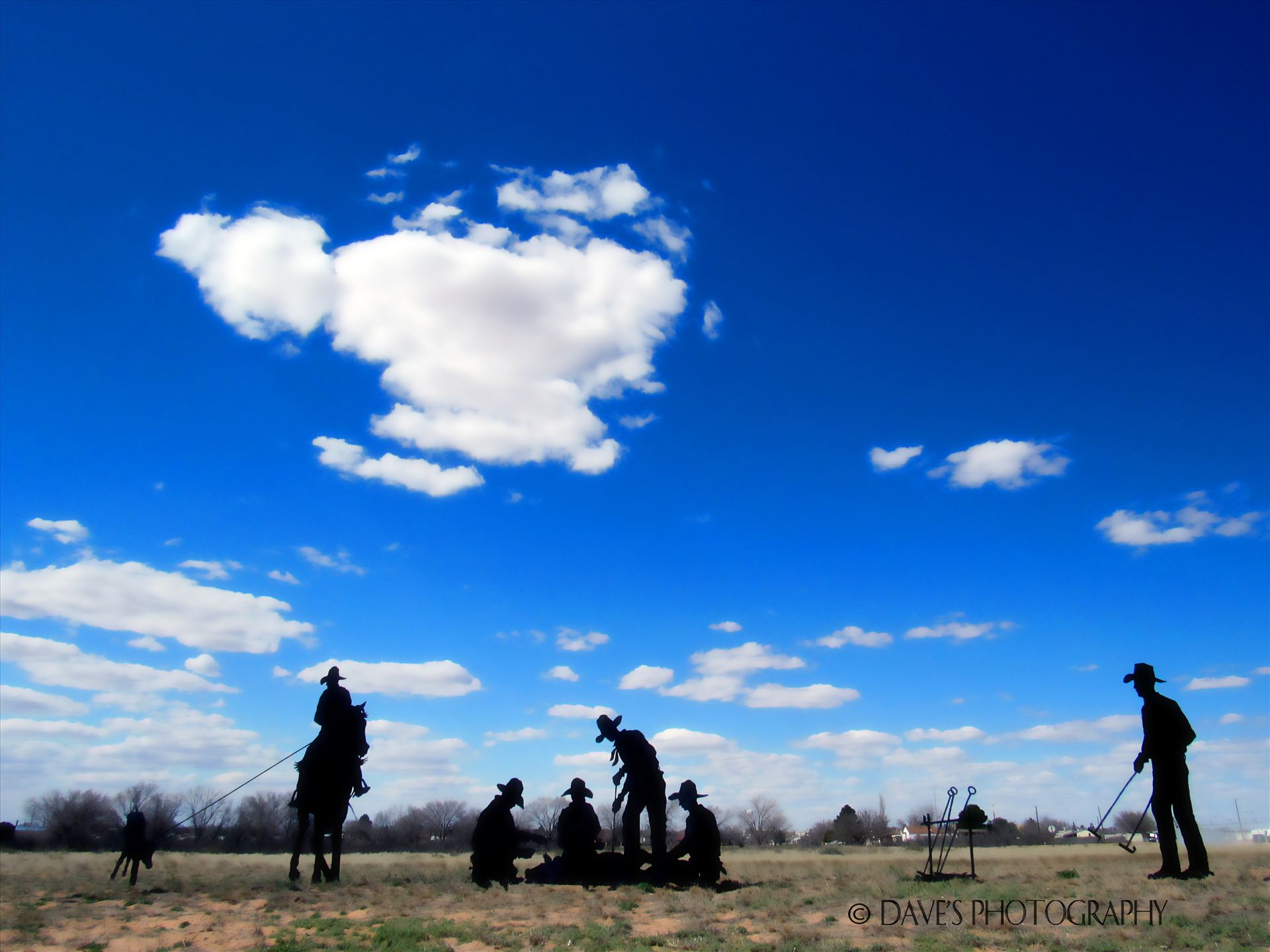 Making Their Mark Sculpture - By Local Artist Brian Norwood by David Verschueren